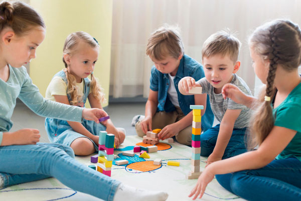 kids-playing-together-kindergarten